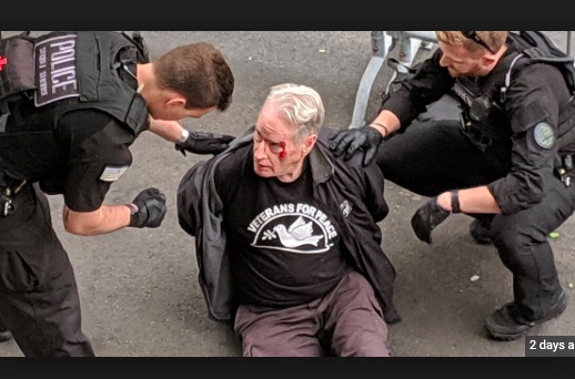 USA: Veterans For Peace Board President Gerry Condon was violently arrested in front of the Venezuelan Embassy yesterday afternoon attempting to deliver food to people inside.